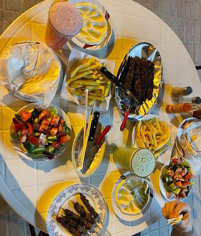 محل اللحوم المشوية - صلالة -