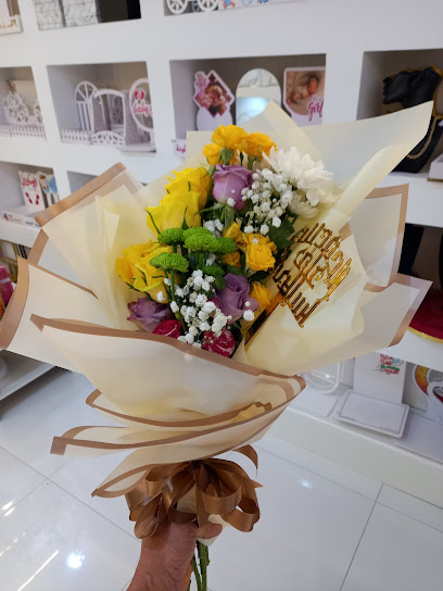 سلة الزهور الذهبية (محل الزهور) - Oman|311|Sohar Street (Service Road Sohar