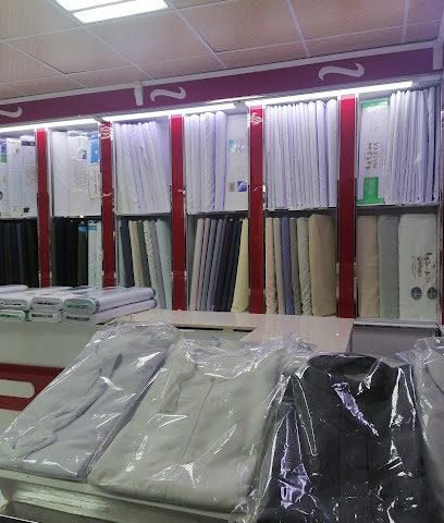 الريشة خياطة الملابس الرجالية - خصب - +968 7835 7820